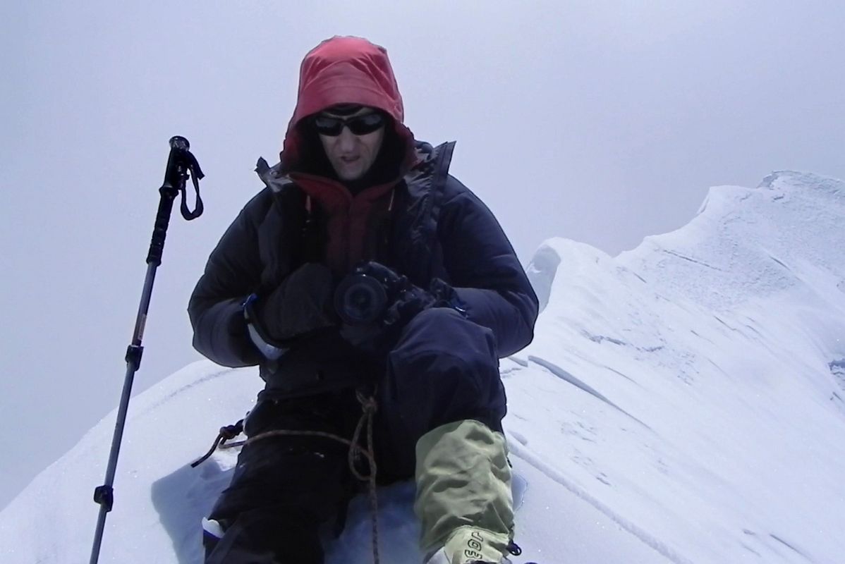 64 Jerome Ryan Taking Photos While Sitting On The Lhakpa Ri Summit 